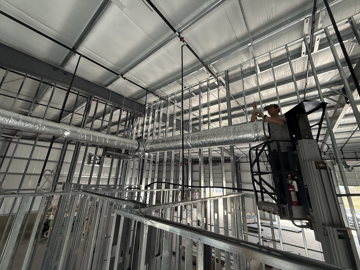 Cameron installing commercial ductwork