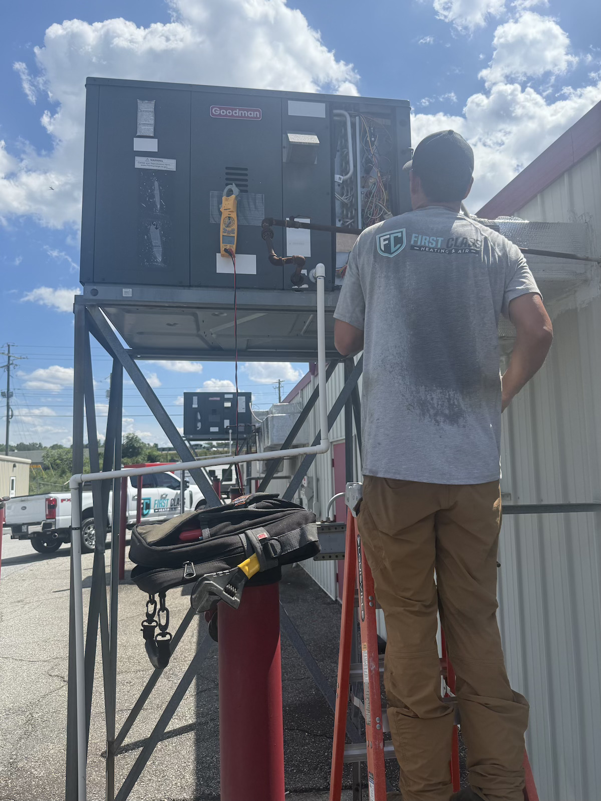 Cameron servicing a Goodman commercial package unit