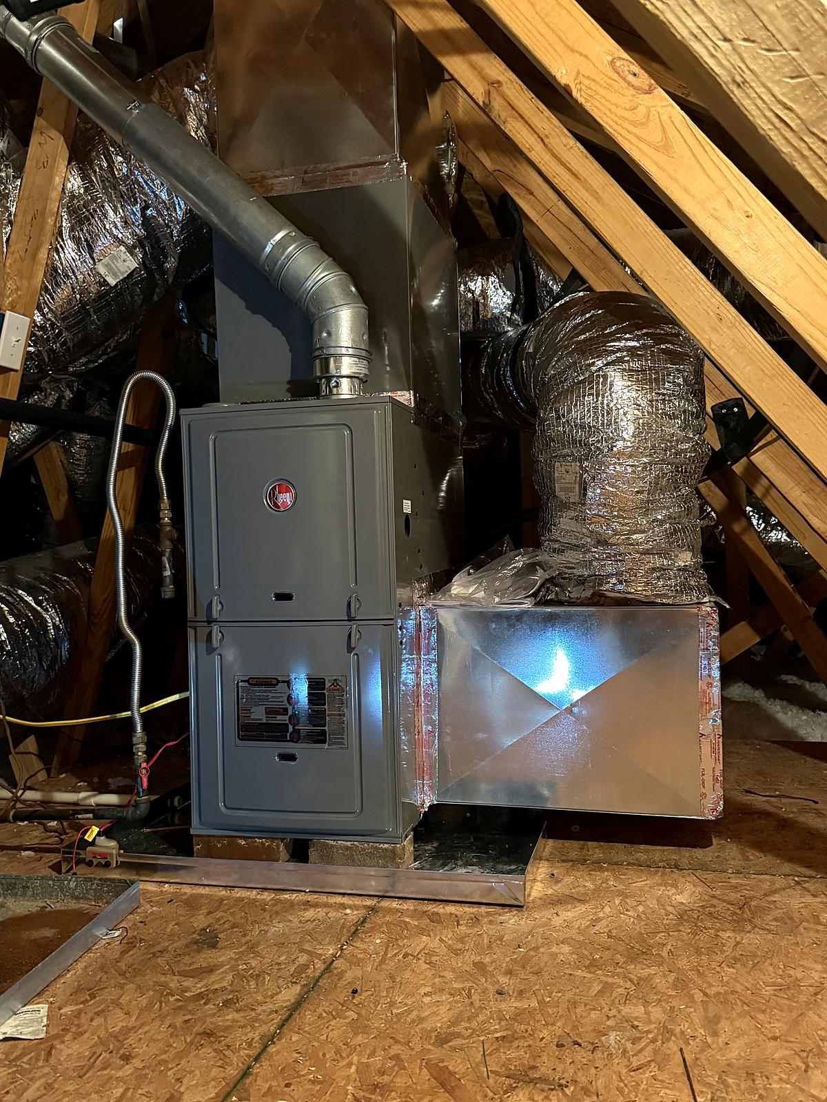 Rheem furnace replacement in an attic with new supply plenum and flue venting
