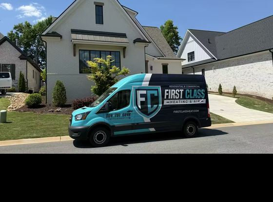 A First Class Heating & Air service van parked outside a customer's home in Greenville, SC