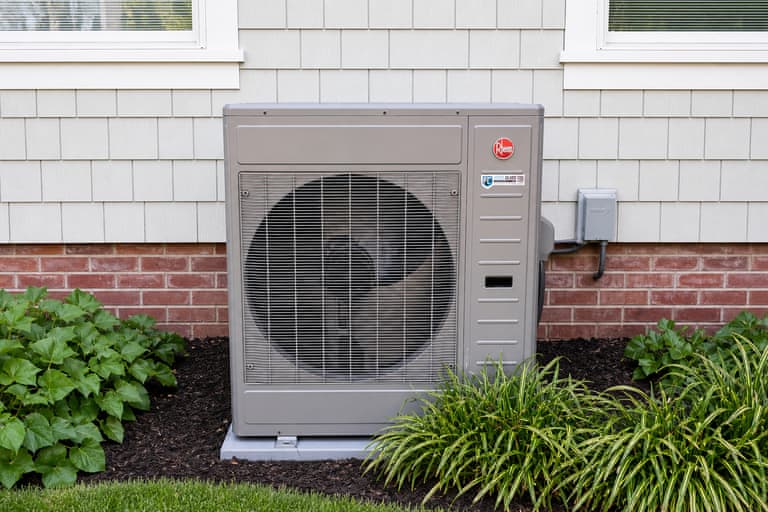 First Class Heating and Air Rheem residential heat pump installed at a Greenville SC home